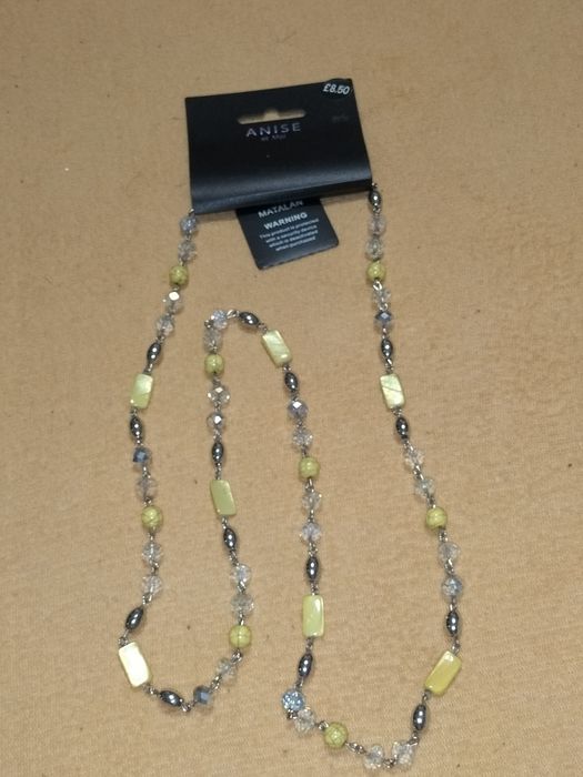 Wisiorek z kamieni przezroczystych, żółtych i srebrnych