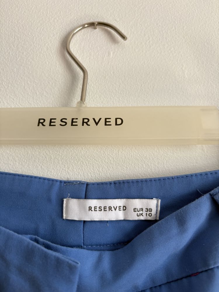 Niebieskie spodnie eleganckie z Reserved