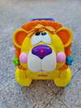 Andarilho Leão da Fisher Price