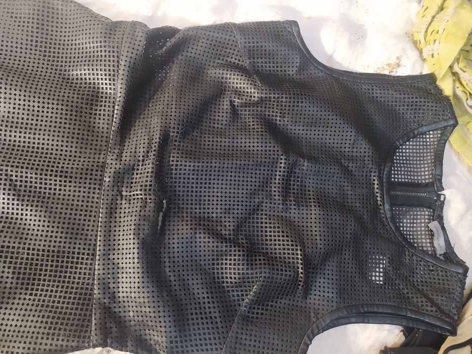 Sukienka skórzana.Calvin Klein