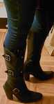Botas cano alto em pele