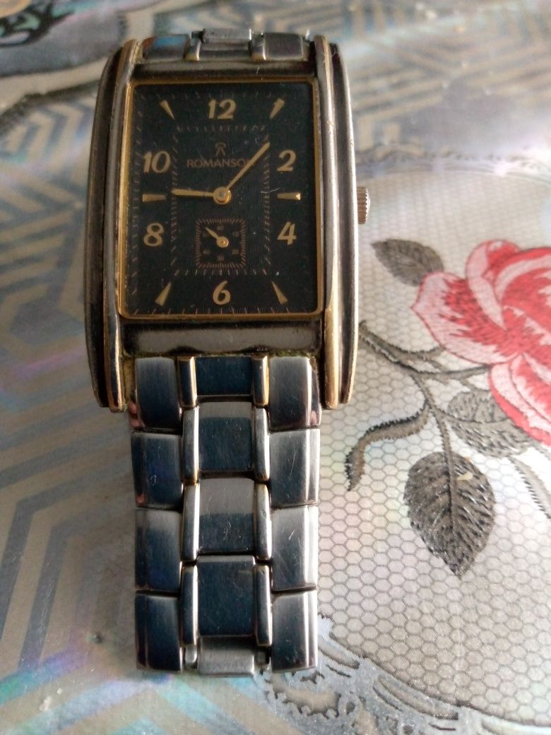 Продам часы романсон , с золотыми стрелками  и цыфрами.