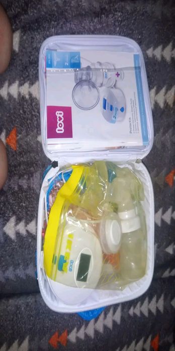 Молокоотсос 2в1 новий