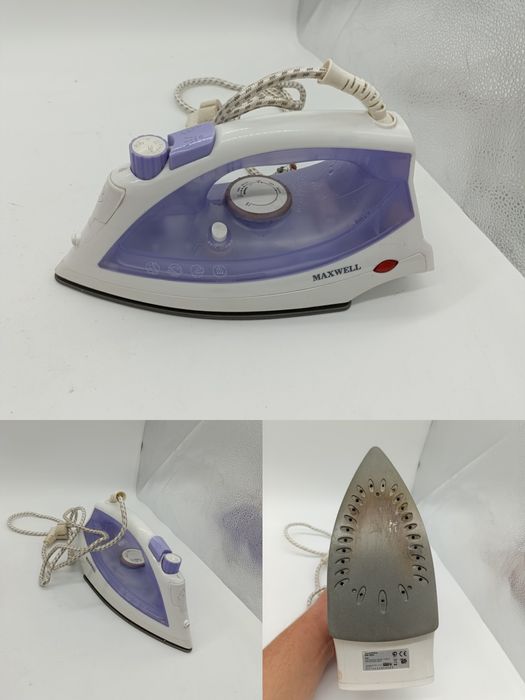 Сучасна праска в робочому стані з паром Tefal дорожня маленька праска