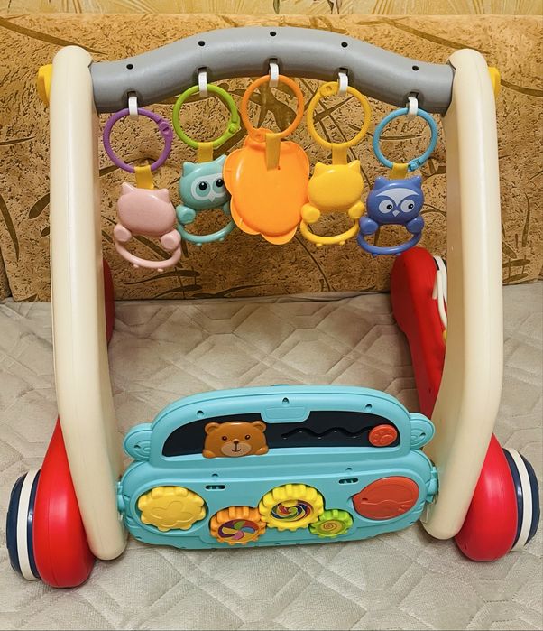 Дитяча каталка - ходунки