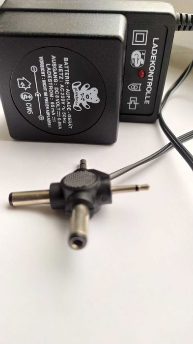 135 гривен Блок питания , Зарядное устройство , Штекер 4 в 1 / Germany