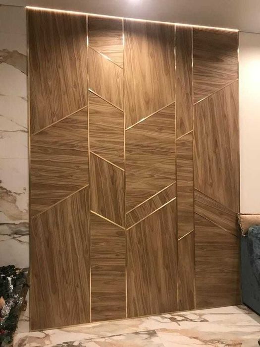 Панелі стінові з латунними вставками