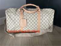 Nowa torba podróżna Louis Vuitton.