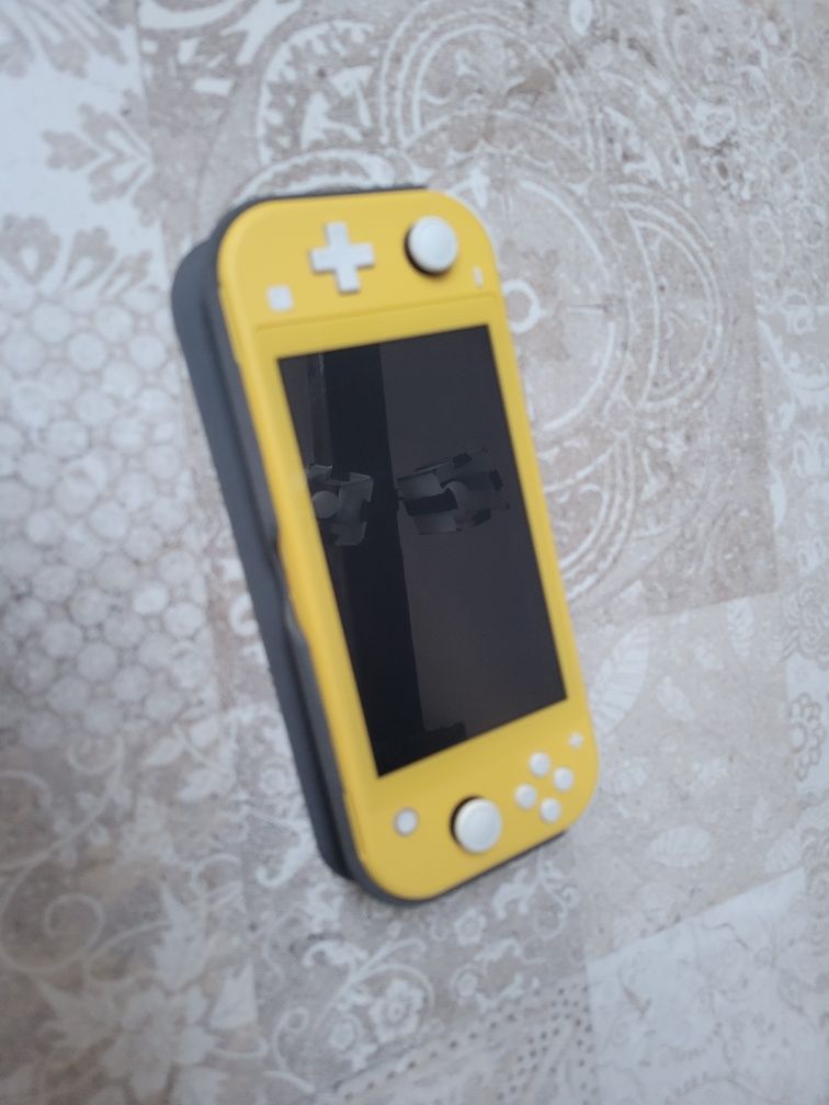 Nintendo switch lite + оригінальний чохол