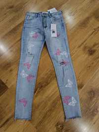 Nowe spodnie damskie jeansy