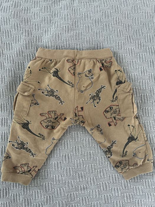 Beżowe/brązowe  spodnie w zwierzęta 80 cm,