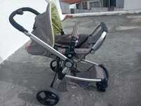 Carrinho de bebe e ovo