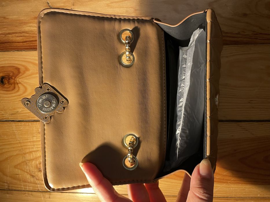 Bolsa castanha novos