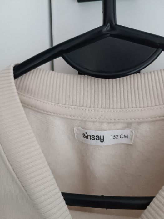 Kremowa bluza rozmiar 152 cm Sinsay