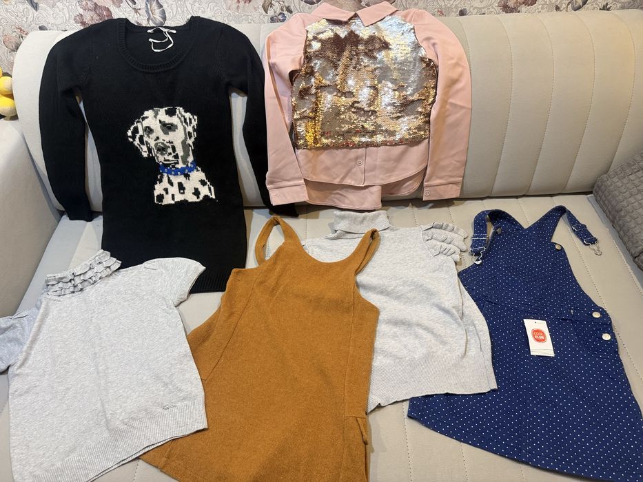 Дитячі речі на 6–9 років.