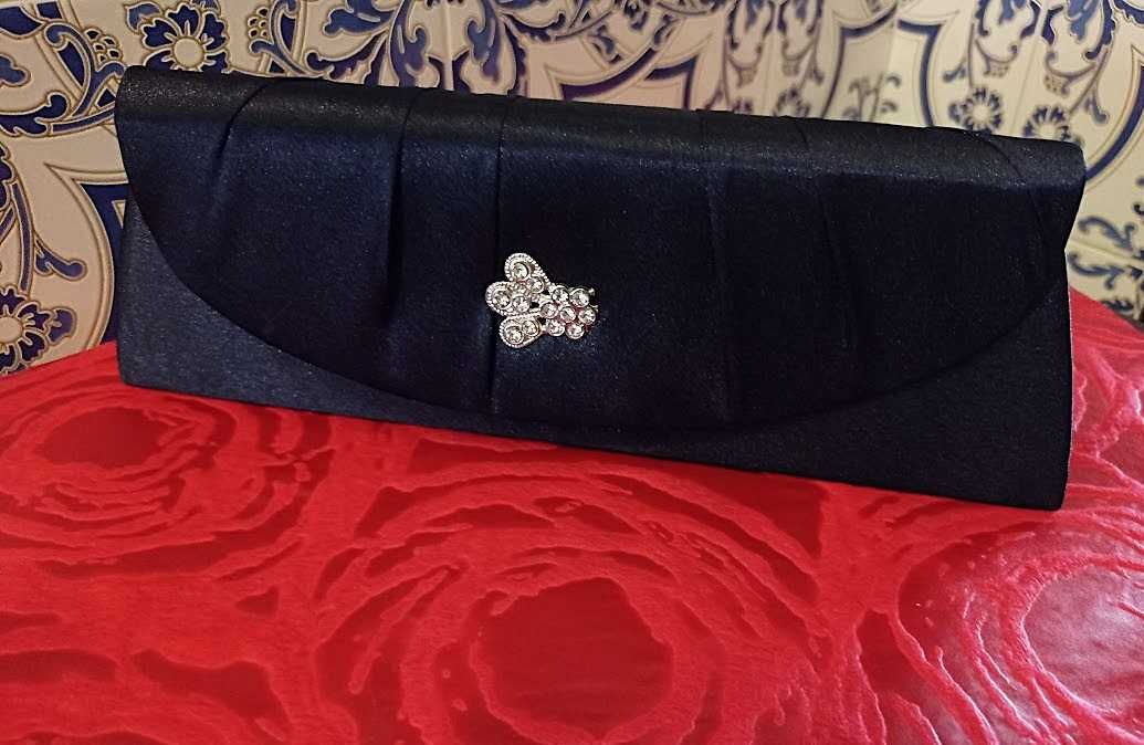 Bolsa Clutch de mão, elegante e feminina e intemporal