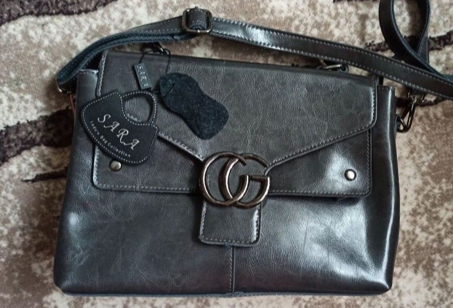 Кожаная сумка   .