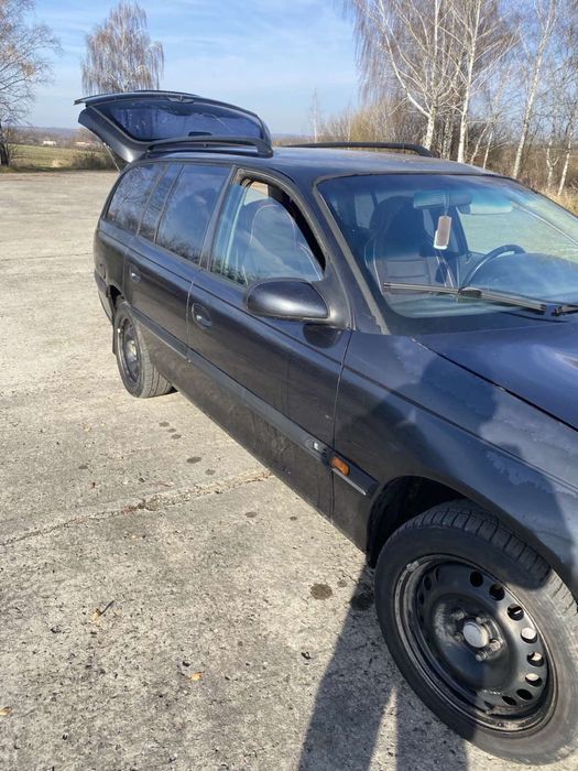 Опель омега б автомат