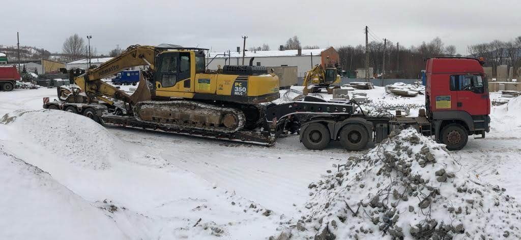 Transport niskopodwozie. Transport koparki ładowarki maszyny budowlane