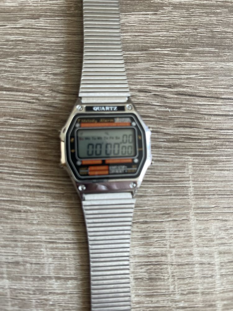 Zegarek Quartz 7 melody stan idealny