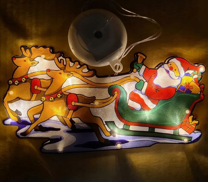 Lampka mikołaj na saniach 25cm LED świecący ozdoba świąteczna na święt