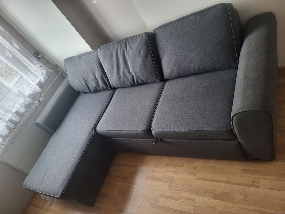 Narożnik z funkcją spania. Rozkładana ciemnoszara Sofa.
