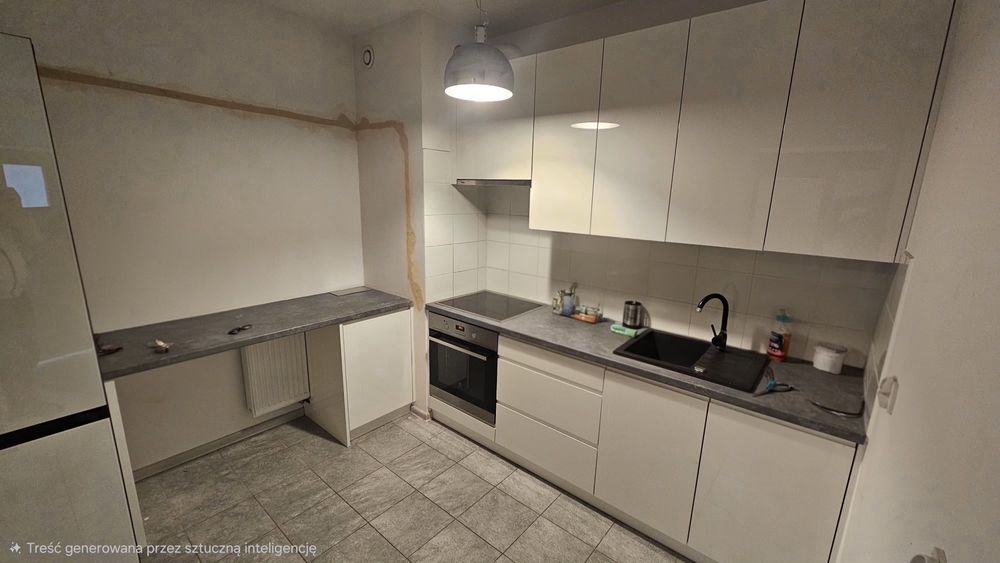 Meble kuchenne z wyposażeniem.