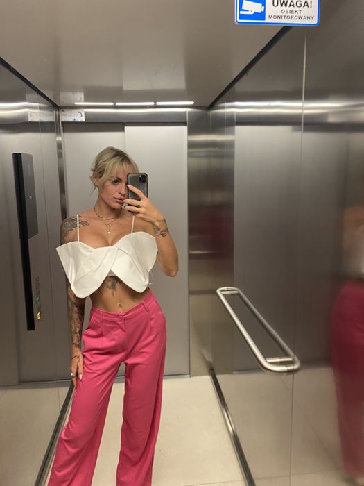 Rozowe eleganckie lub codziennie spodnie