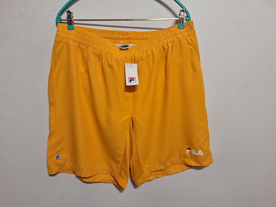 Нові жовті шорти Fila