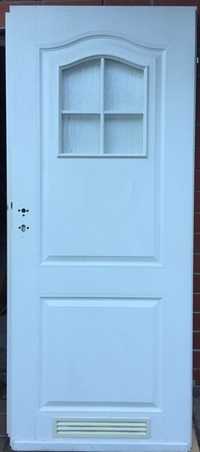 Drzwi Porta kolekcja Londyn z szybą i kratką, białe