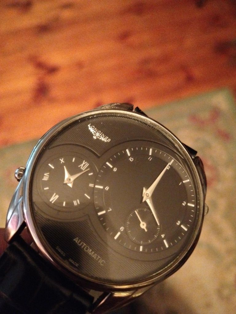 Часи наручні  Longines automatic swiss made