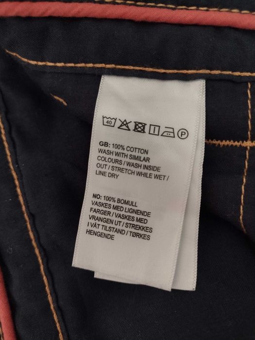 jasno pomarańczowe spodnie Cubus typu chinos - rozmiar W34 L32