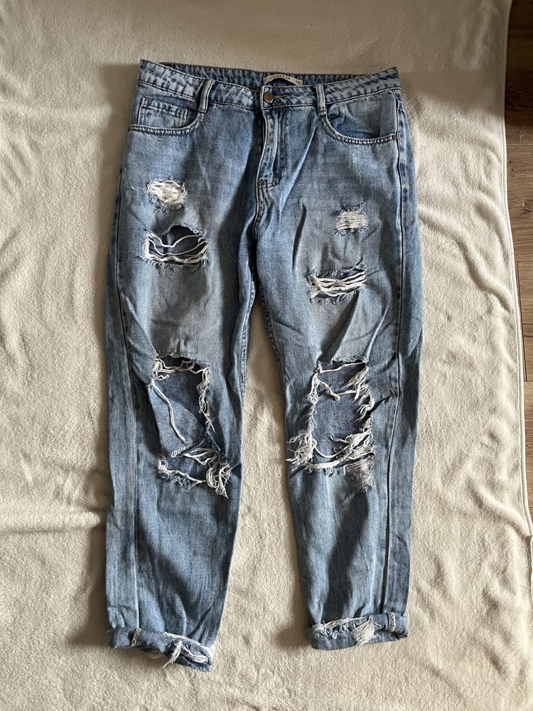 spodnie mom jeans z dziurami laulia 38
