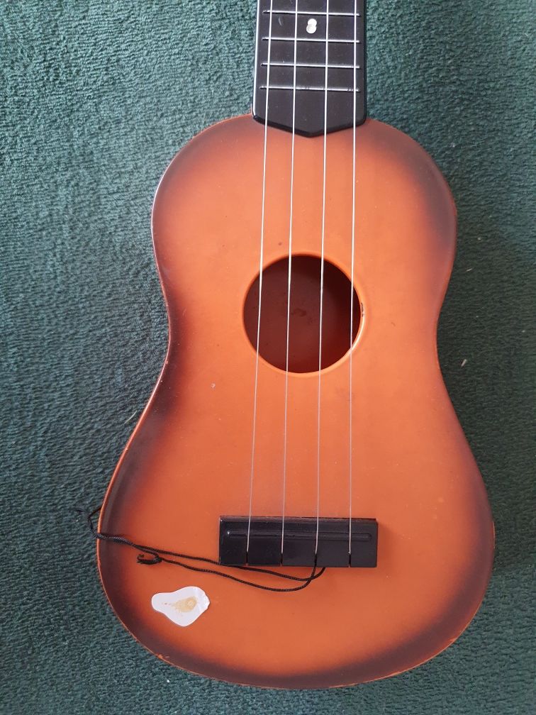 Gitara zabawka klasyczna 4 strunowa brazowa ukulele dla dziecka