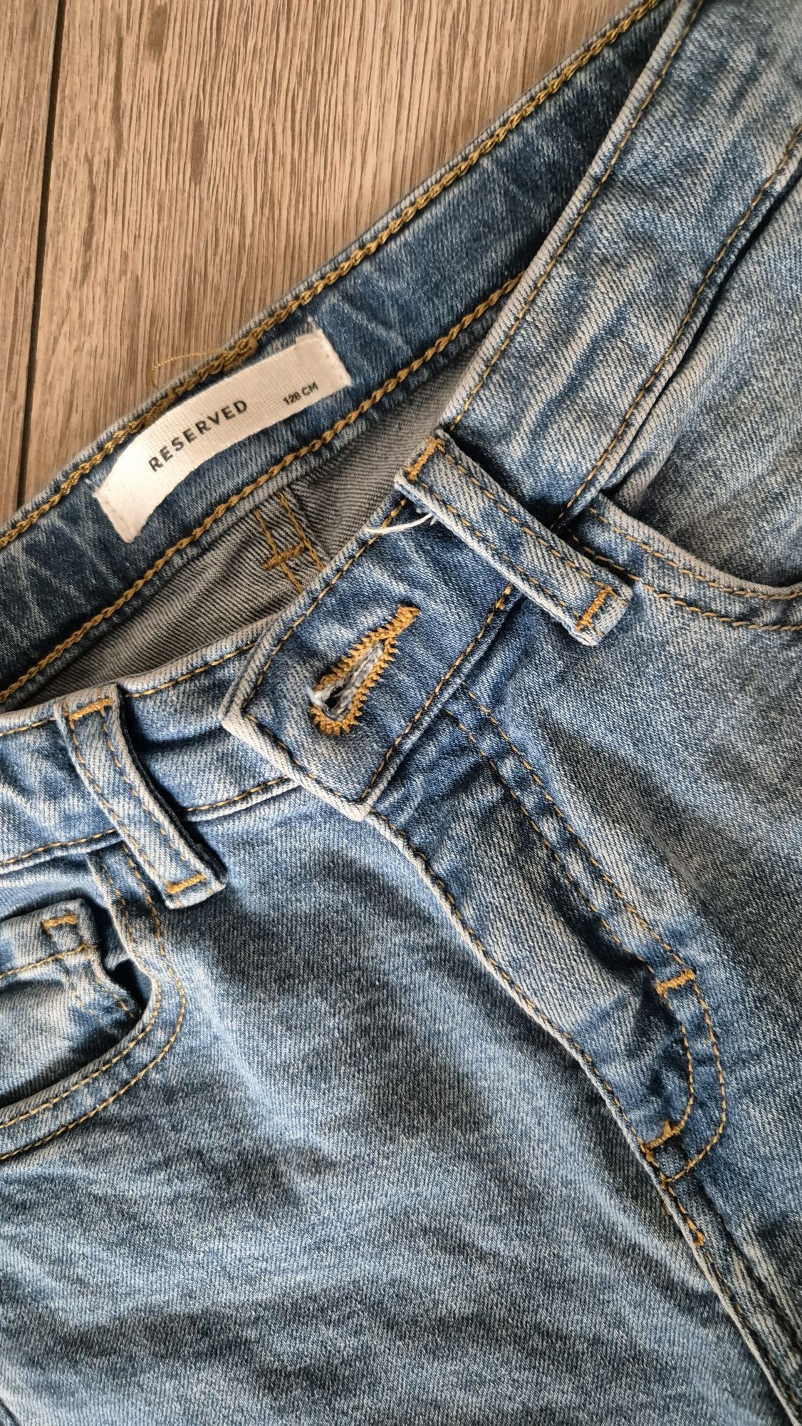 2x spodnie reserved jeans dodatkowo leginsy w prazki rozm 128