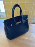 Bolsa, ferragens gold