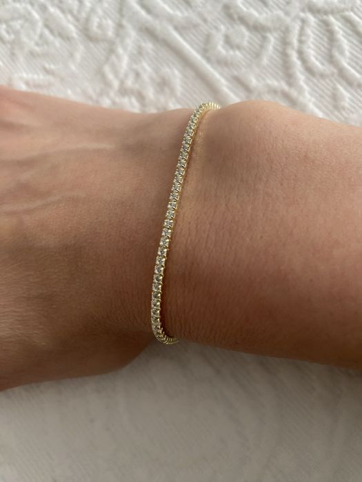 Pulseira prata dourada com zirconias. Novo