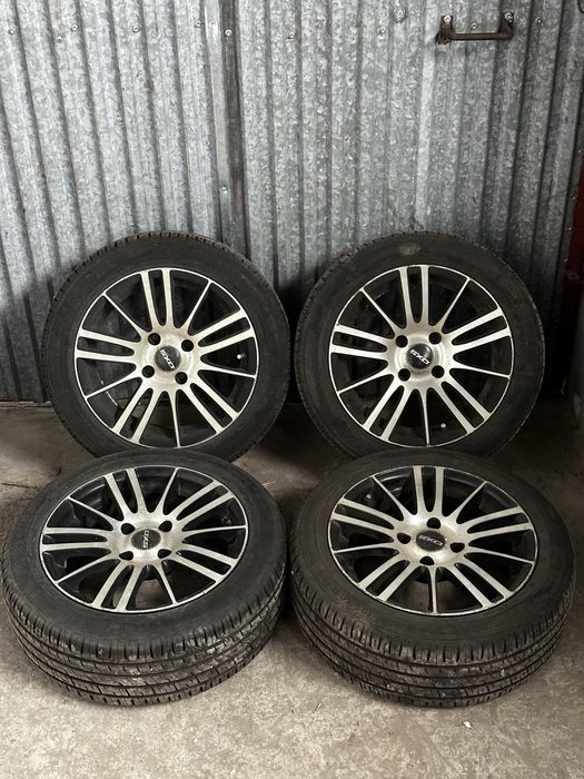 Alufelgi 15” DXS Racing z letnimi oponami Barum w dobrym stanie