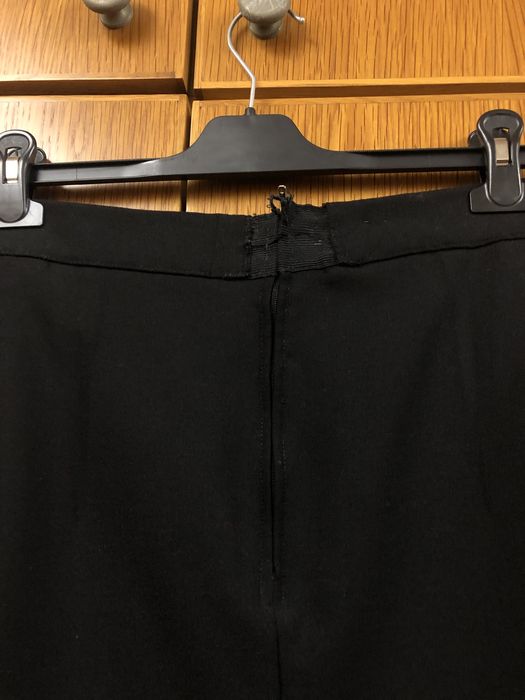 Saia forma preta de lã