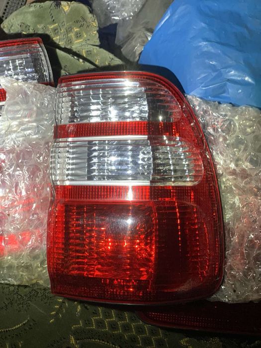 Задні фонарі стопи land cruiser 100