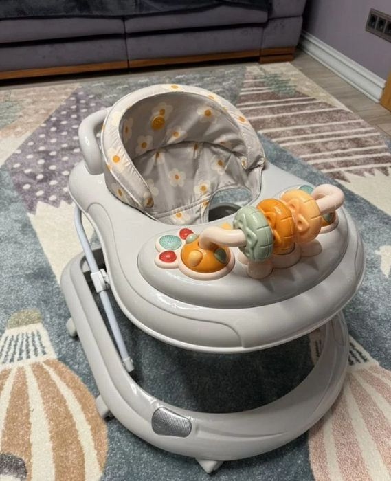 Дитячі ходунки happy baby.