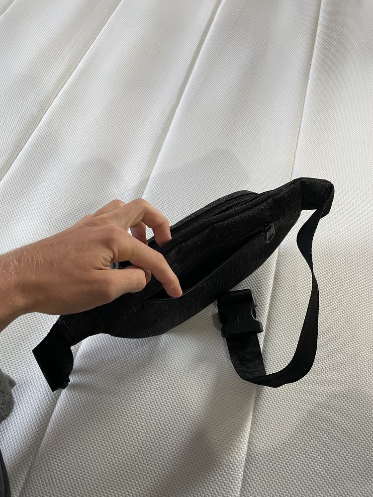 Bolsa de cintura Ripcurl nova