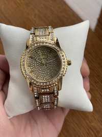 Жіночий годинник Rolex на браслеті з камінцями