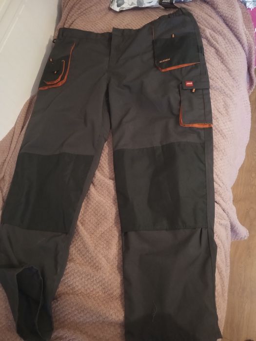 Spodnie monterskie do pasa rozm. 64 nowe dużę