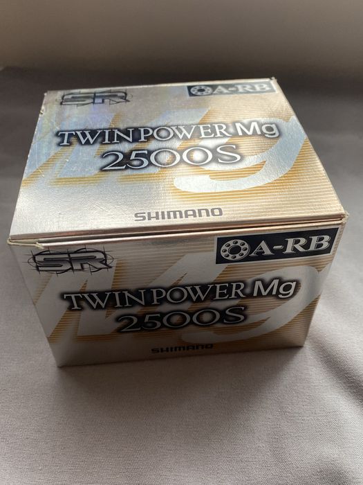 Kołowrotek Shimano Twin Power 06 Mg 2500s 3 szpule 2 korbki
