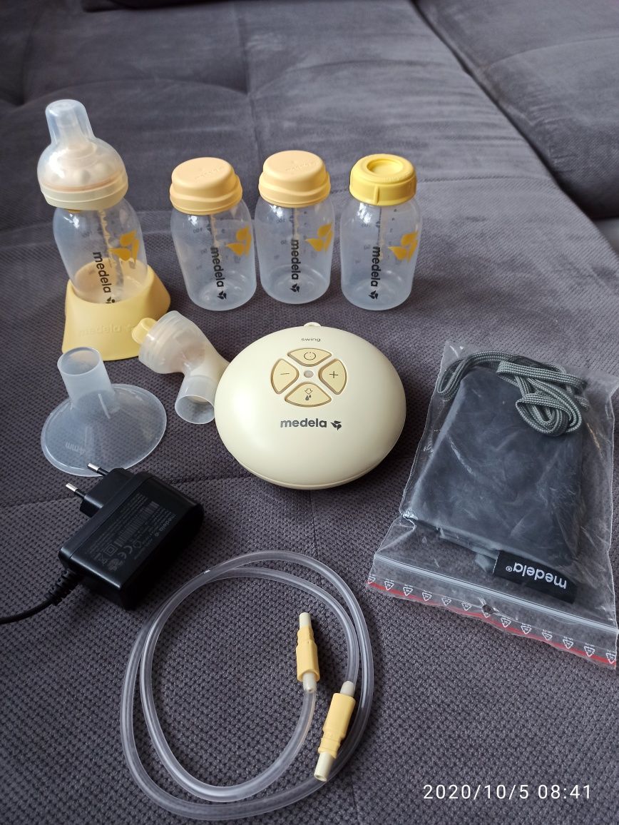 Laktator Medela + sterylizator,Calma.