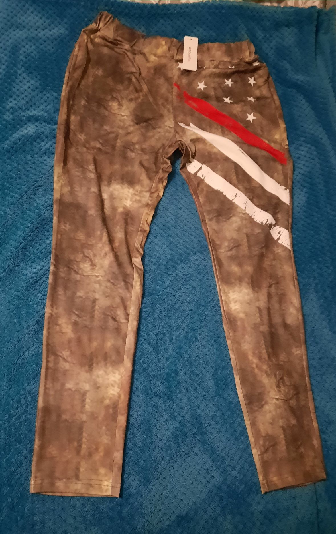 Nowe legginsy w kolorze khaki XK/XXL