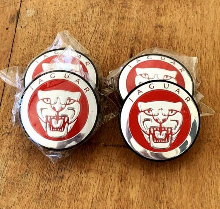 Пластикові заглушки круглі нові ємблема металева  4 штуки