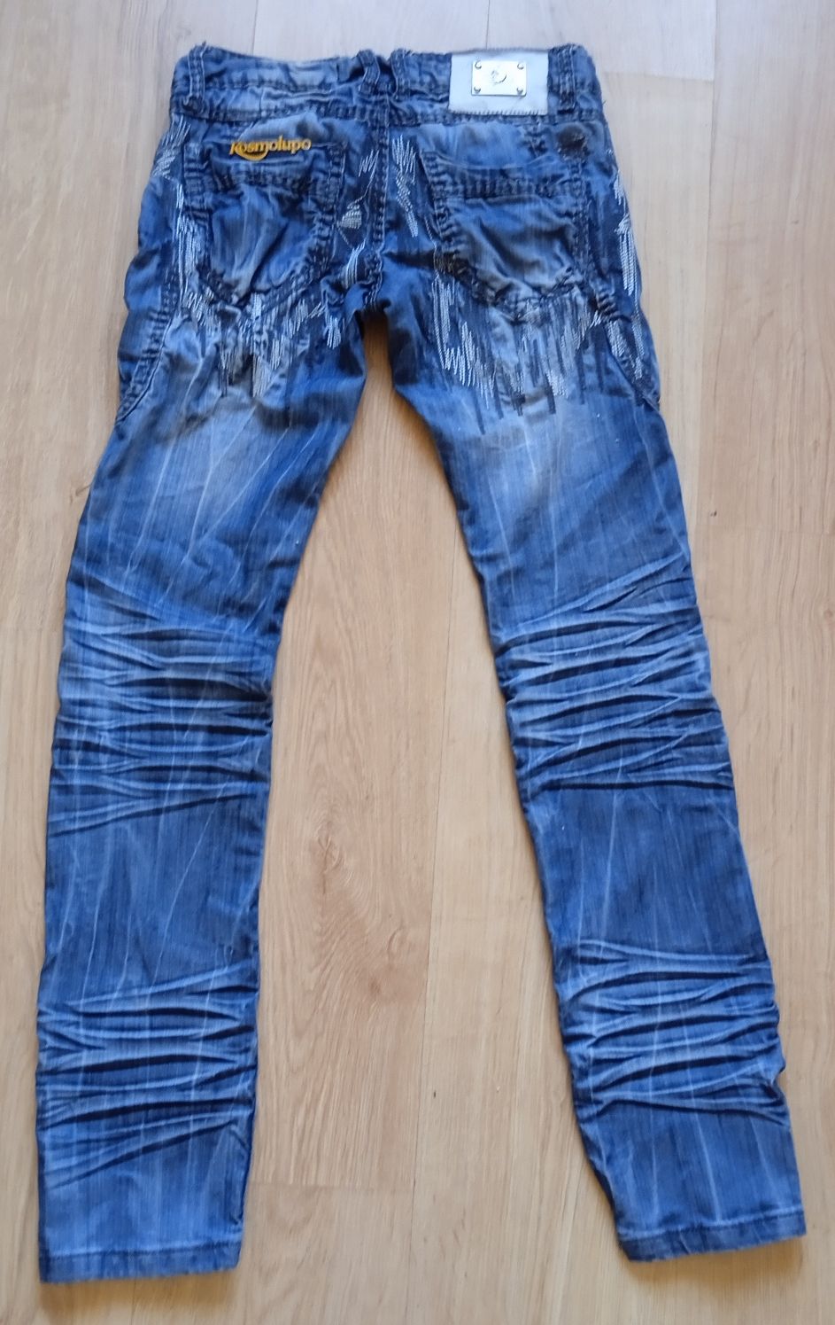Kosmolupo,extra męskie spodnie,r.26,szer.pasa72 cm