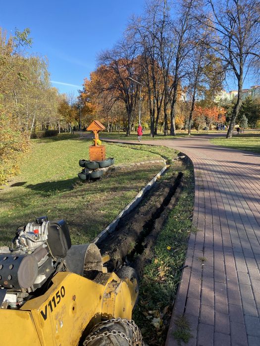 Бара Копка траншей Траншеєкопач Траншеекопатель Укладка кабеля.